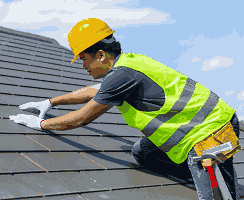 Image showing a man fixing a roof